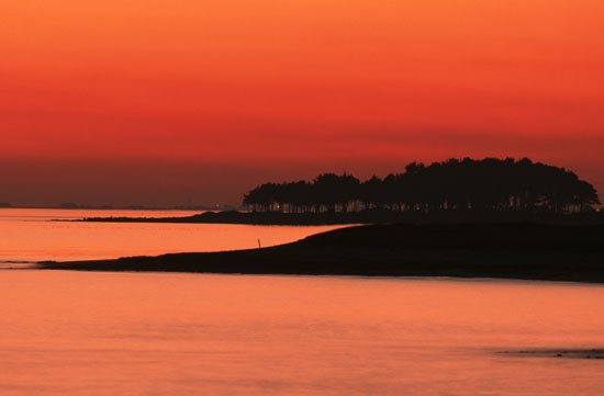 Soleil qui se couche sur le golfe du Morbihan